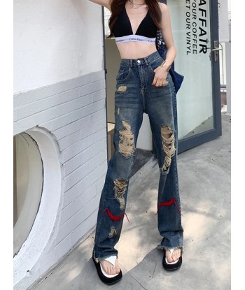 Grunge jeans in distressed look with red accents outlet