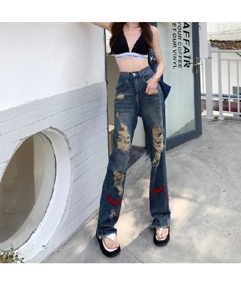 Grunge jeans in distressed look with red accents outlet